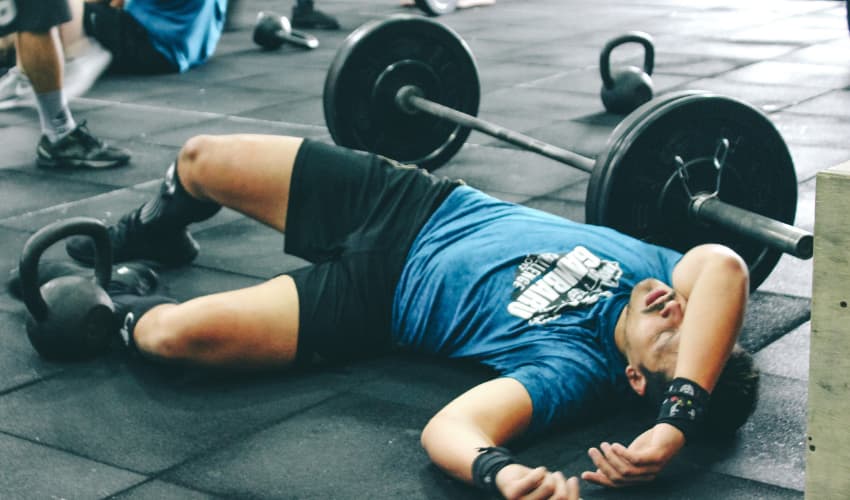 Tired on ground at gym