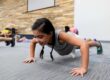 young student completing a push up assessment in PE class